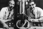 George Palade and Philip Siekevitz at the Electron Microscope by The Rockefeller Archive Center